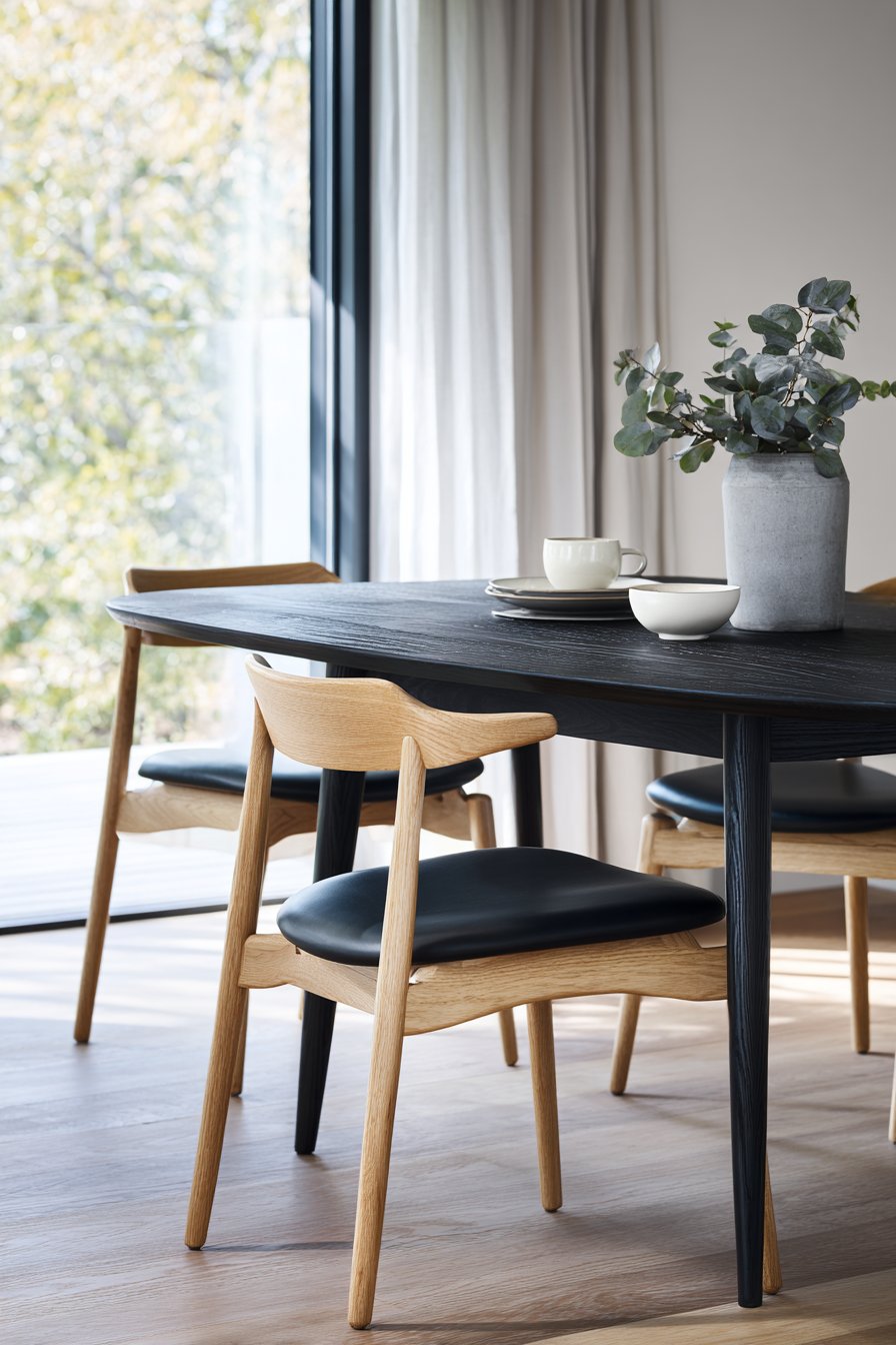 Minimalist Black-Stained Ash with Scandinavian Chairs