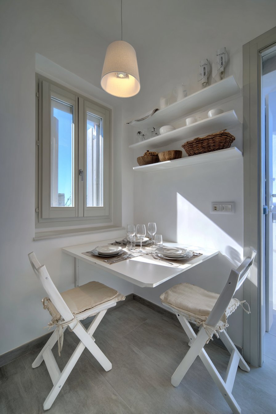 Compact White Drop-Leaf Functionality