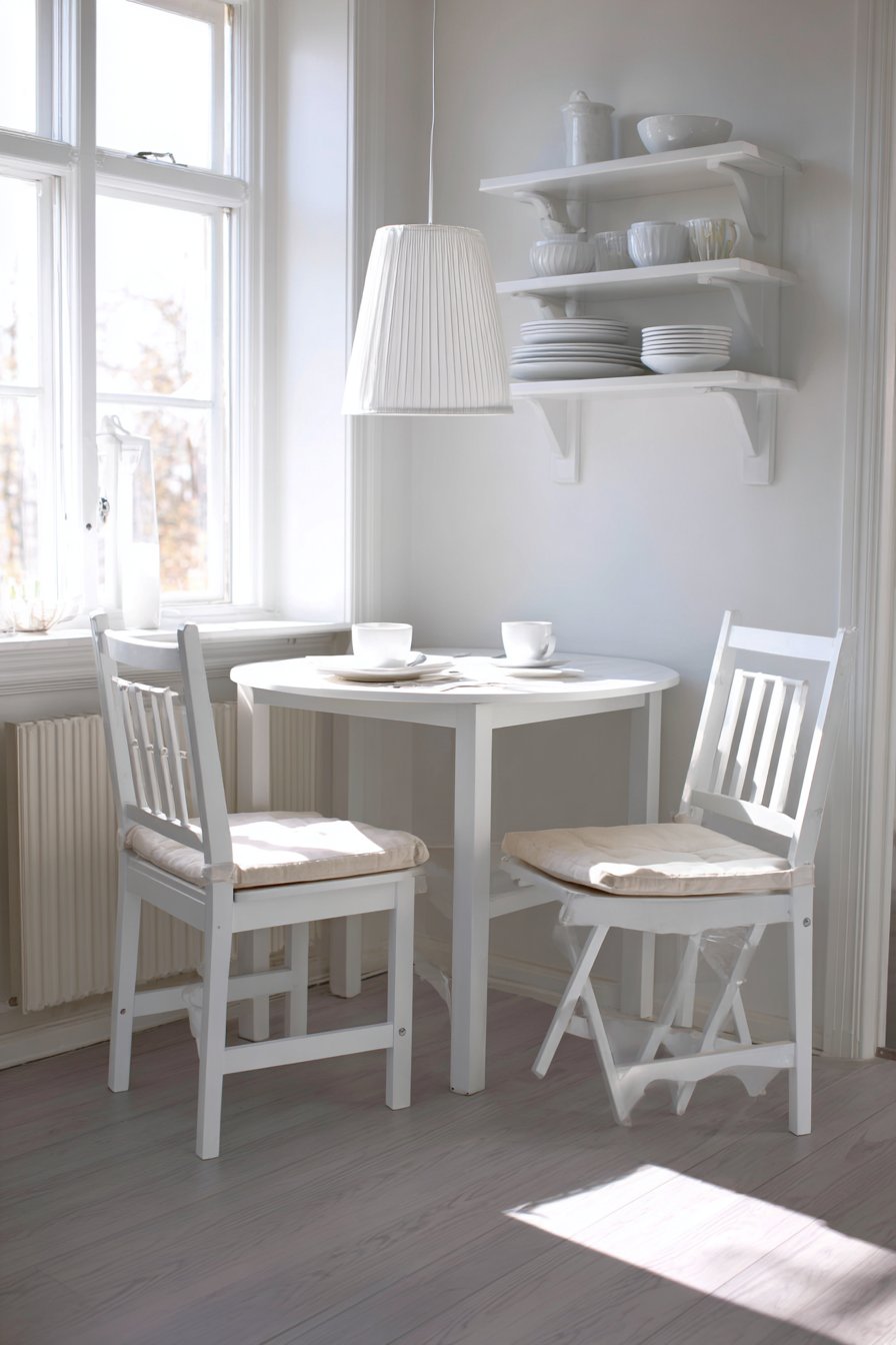 Compact White Drop-Leaf Functionality